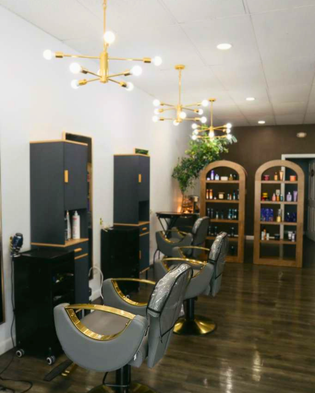 Styling stations with brass chandeliers